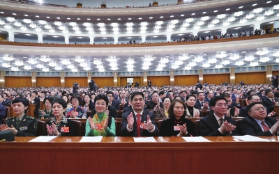3月13日，中国人民政治协商会议第十三届全国委员会第二次会议在北京人民大会堂闭幕。这是委员们在认真听会。□新华社记者王晔摄